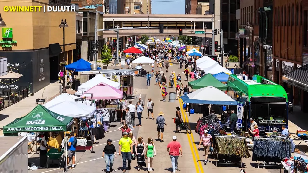 Busy outdoor dining area in downtown Duluth